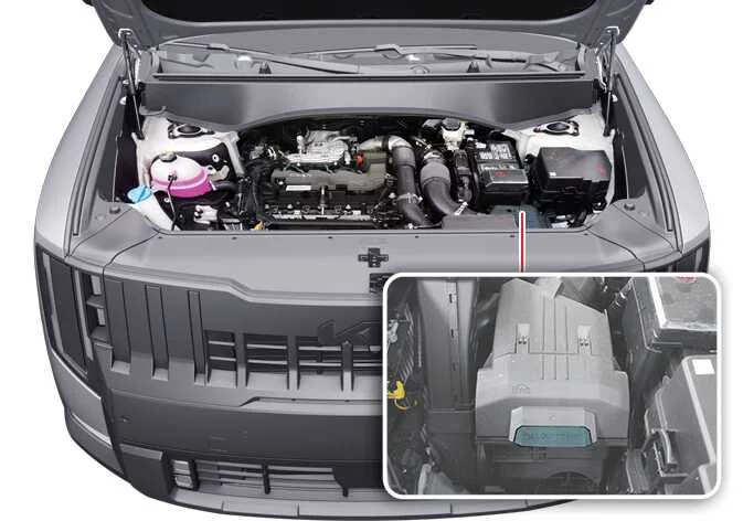 Releasing the locking lever on the Kia Telluride air cleaner filter housing cover