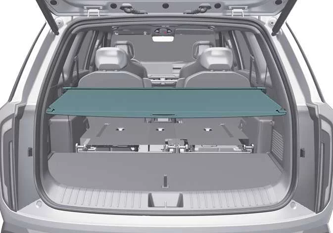 Installed cargo security screen covering the rear luggage area of the Kia Telluride