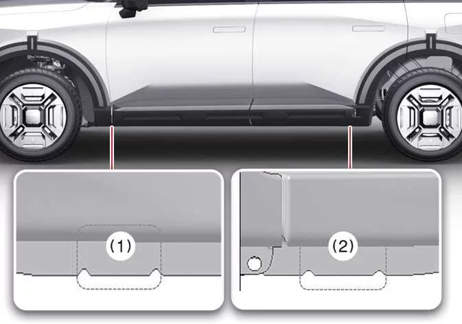 Front jacking point location marked under the frame of a Kia Telluride