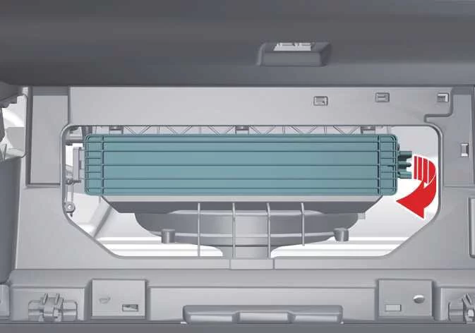Removing the clip-on climate control cabin air filter access cover in a Kia Telluride