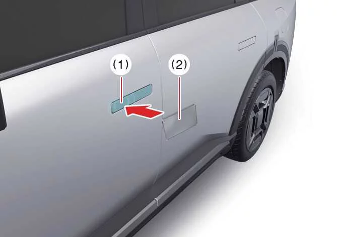 Kia Telluride Digital Key 2 card key touching the exterior door handle authentication pad