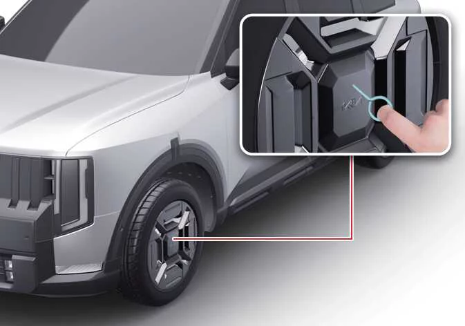 Kia Telluride wheel cover removal procedure using factory trim remover tool