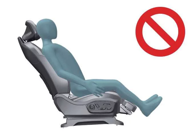 Illustration showing the importance of proper upright seating posture for passenger safety