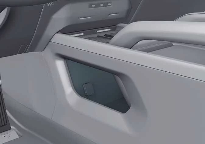 Open center console storage area in Kia Telluride interior
