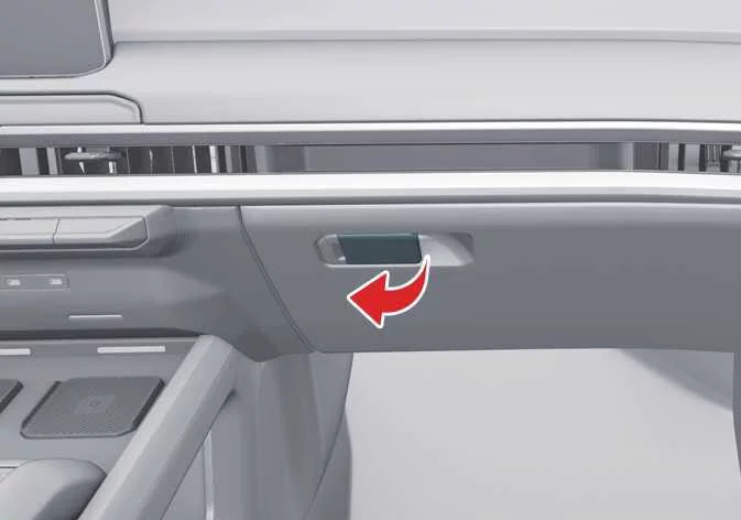 Opening the Kia Telluride glove box using the handle