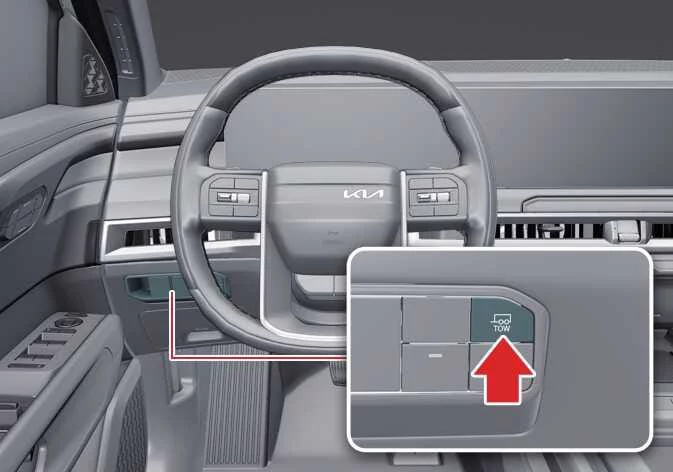 Kia Telluride TOW mode button on instrument panel