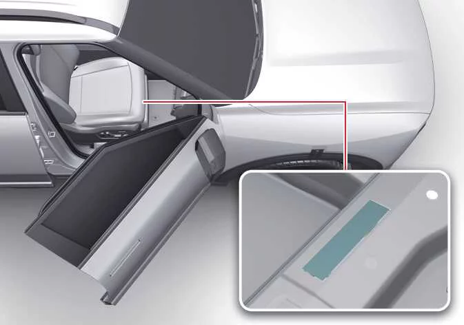 Location of the embossed VIN under the protective floor cover in the Kia Telluride