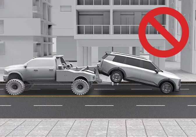 Incorrect backward towing of Kia Telluride with drive wheels rolling on pavement